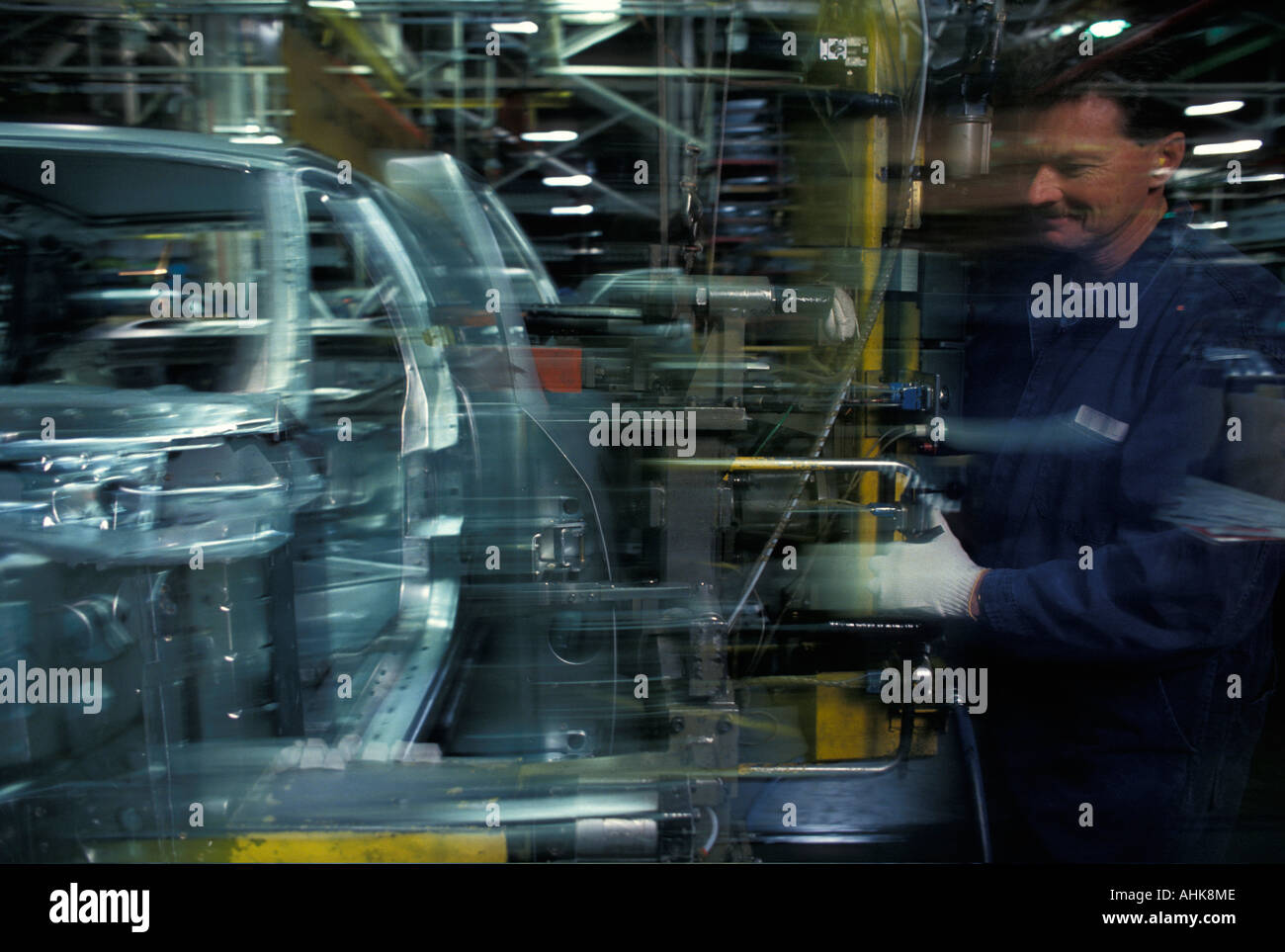 Canada Ontario MR Bob Coughtrey works on new car assembly line at Ford