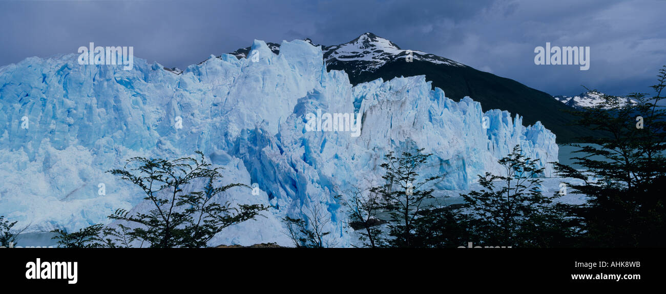 Argentina Glaciares National Park Early morning sun lights blue ice face of Perito Moreno Glacier in southern Patagonia Stock Photo