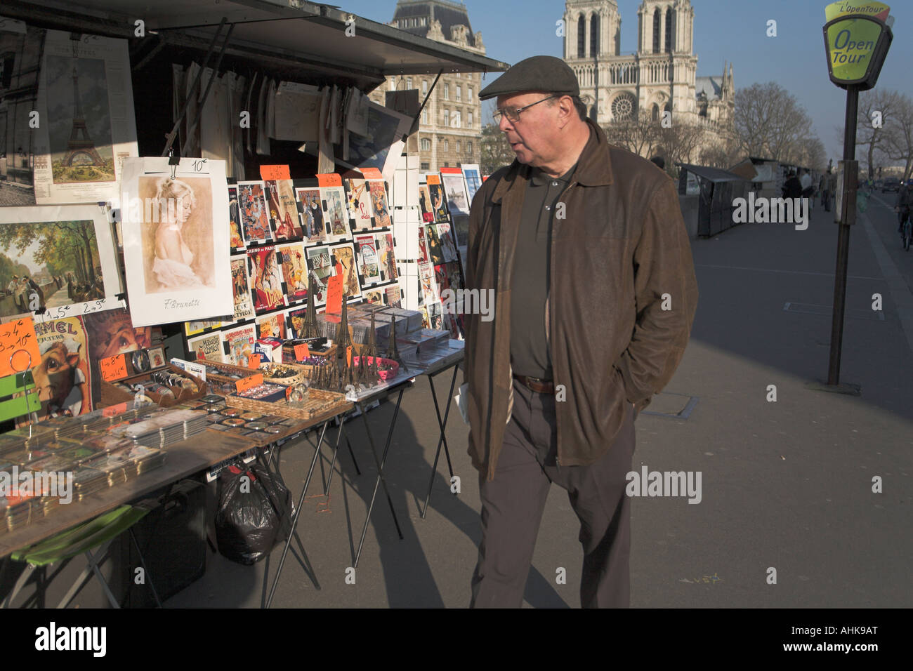 Man looking at souvenir stall by River Seine Paris Stock Photo
