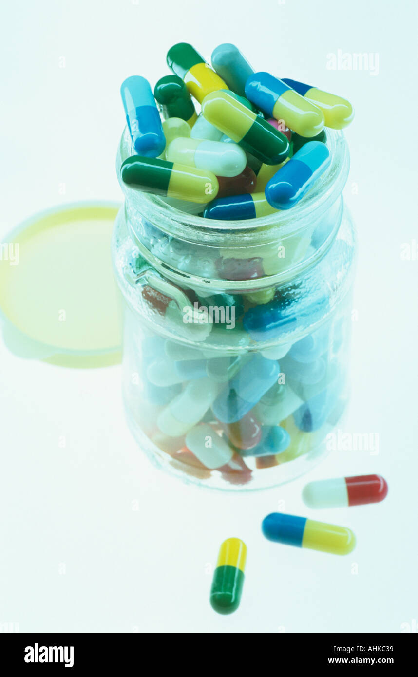 Jar of mixed pills Stock Photo