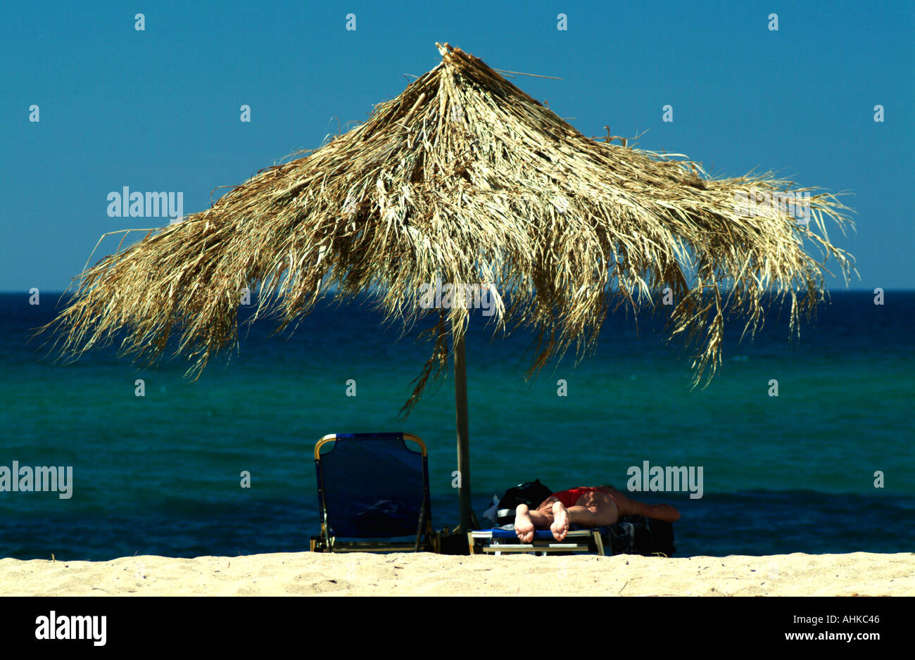 Beach parasol Meghalos Aselinos beach Skiathos Greece Stock Photo