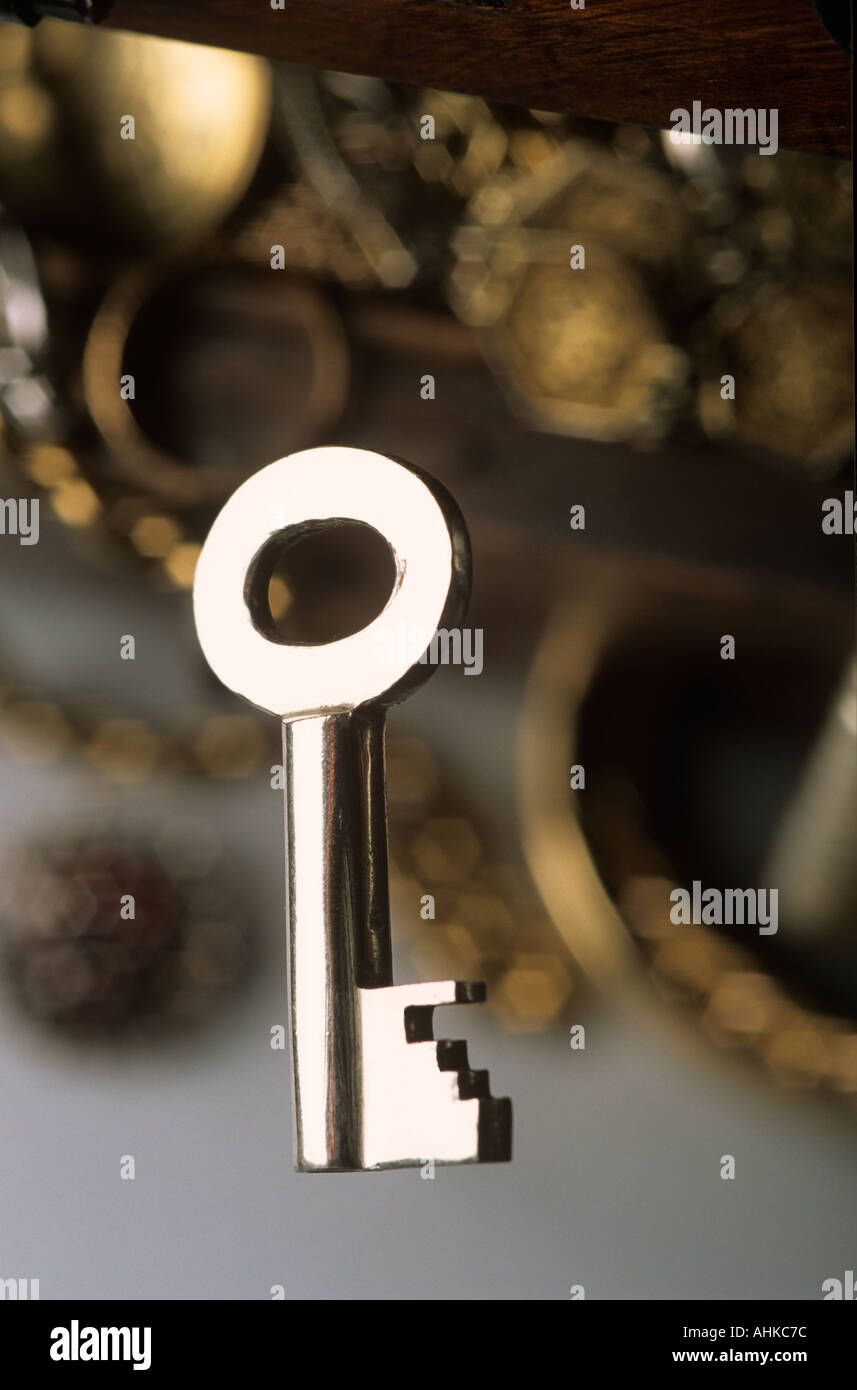 Key to treasure chest Stock Photo Alamy