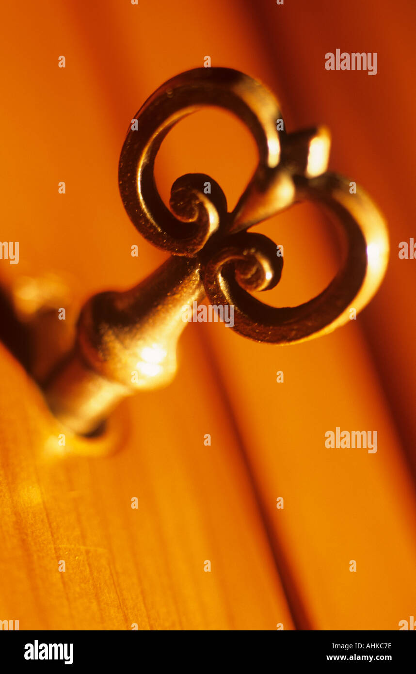 Key in keyhole Stock Photo - Alamy