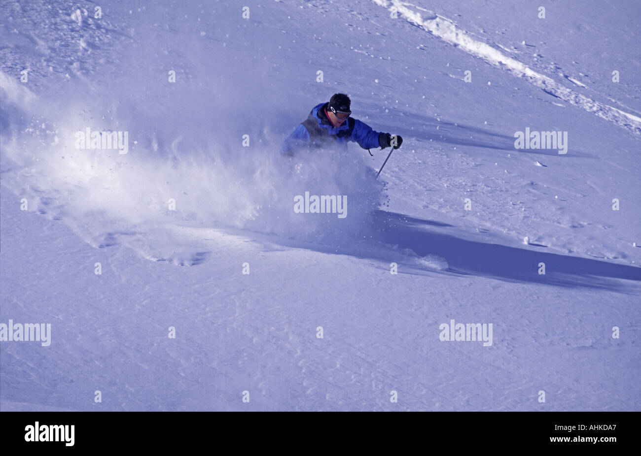 Circa 1988 - An archive photo of a skier skiing powder snow, Courchevel, Savoie, France. Stock Photo