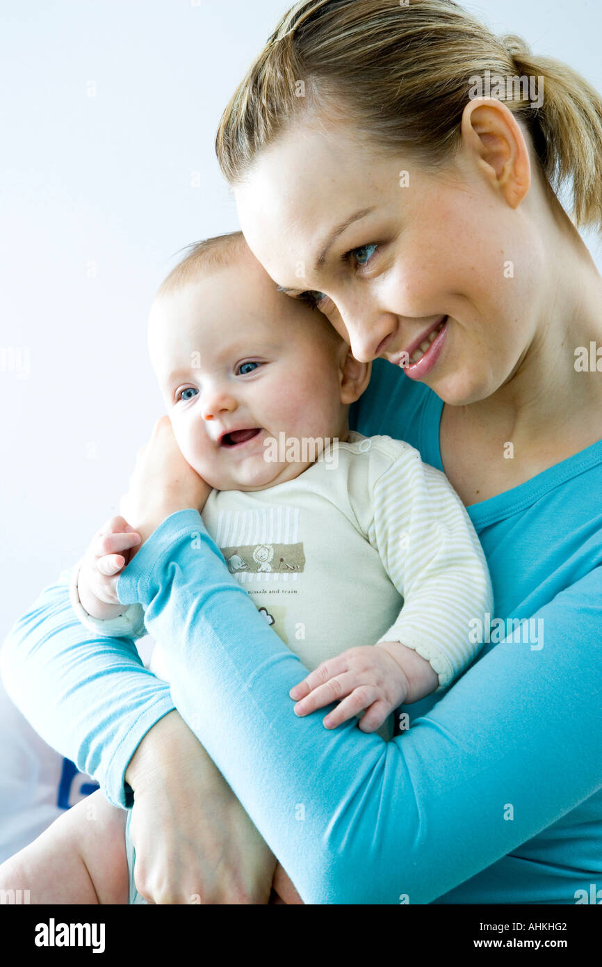 portrait of a mum with baby Stock Photo - Alamy