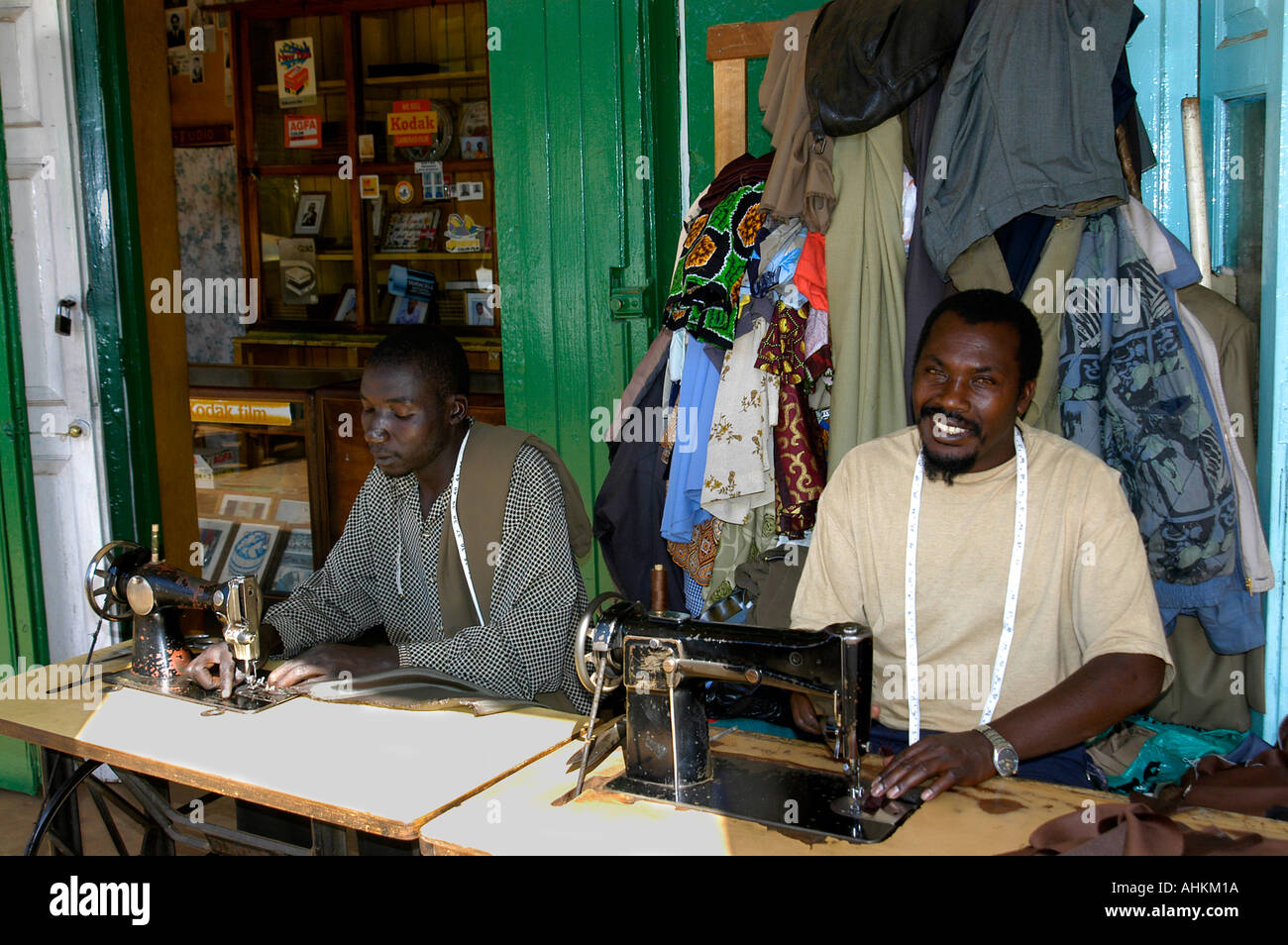 Kenya Tanzania tailor garment sew needlework men Stock Photo