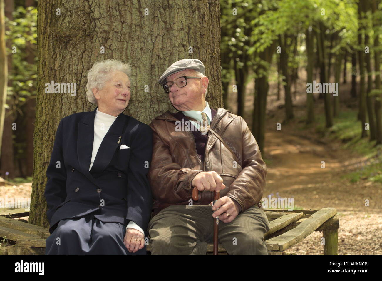 Man sitting under oak tree hi-res stock photography and images - Alamy