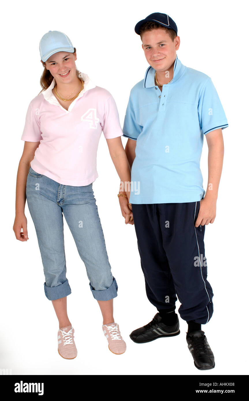 a couple of teenagers dressed as chavs with attitude Stock Photo - Alamy