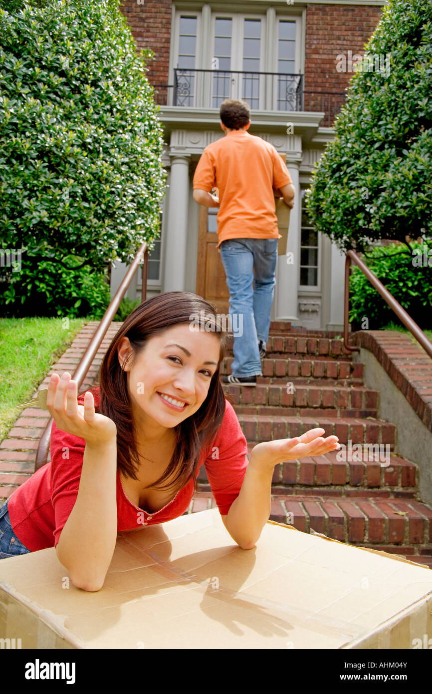 Couple moving into new house Stock Photo - Alamy