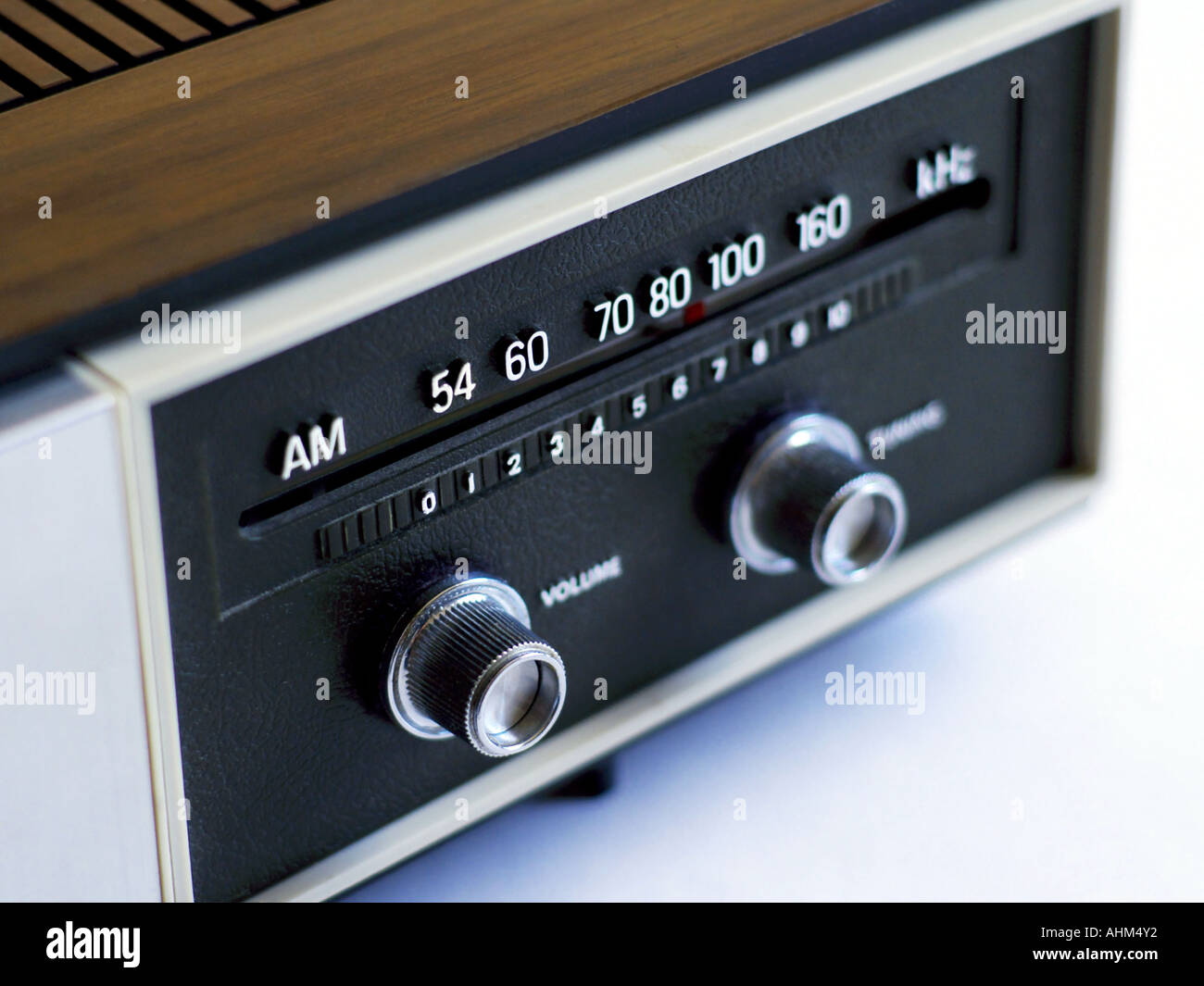 Dial and knobs on a vintage AM radio in soft light and shallow focus Stock Photo