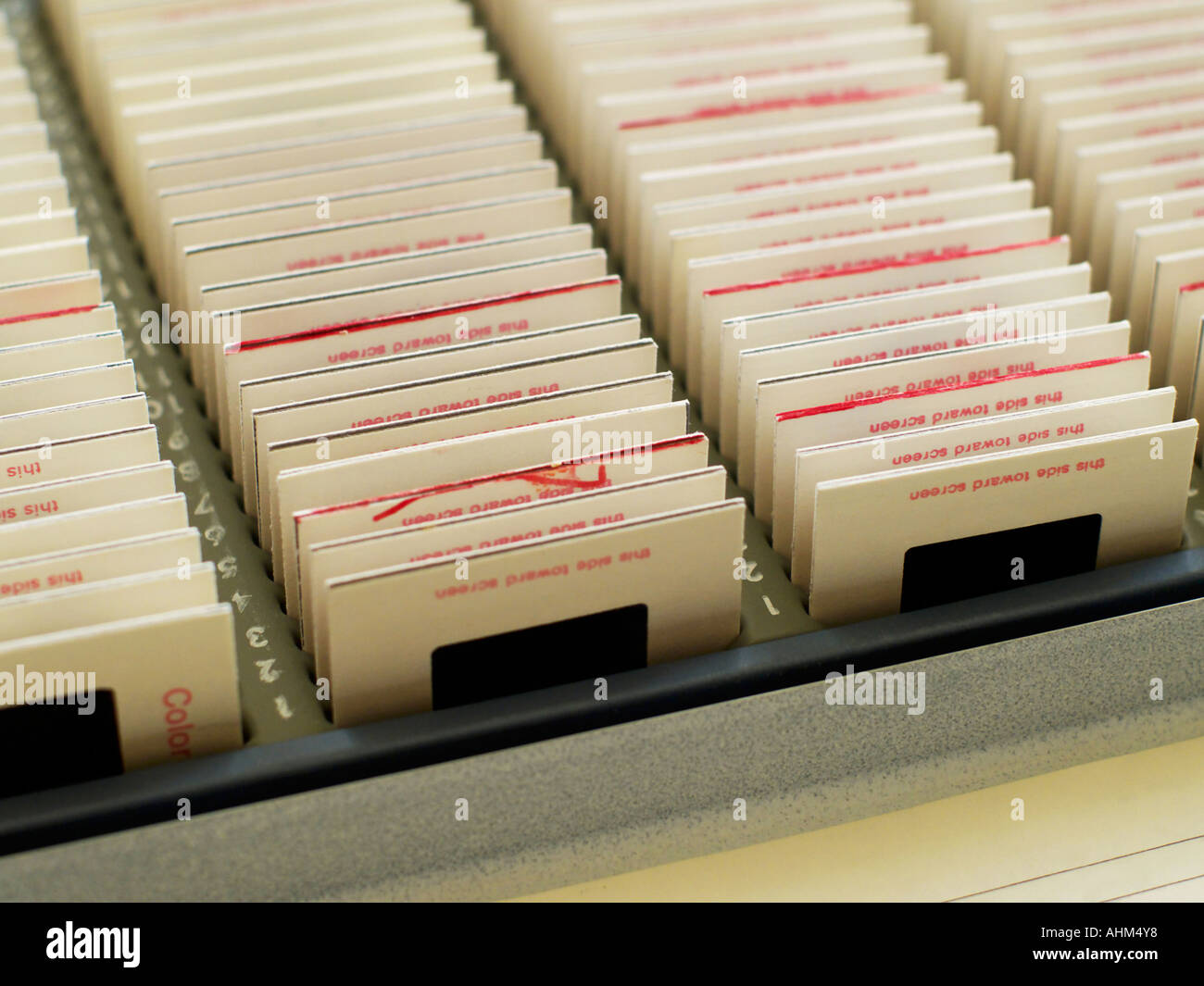 Rows and rows of photographic slides in a slide organizing tray, in shallow focus Stock Photo