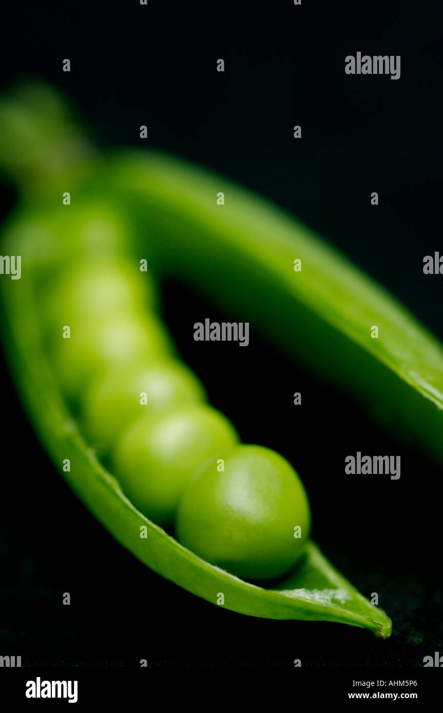 Close up of peas in a pod Stock Photo