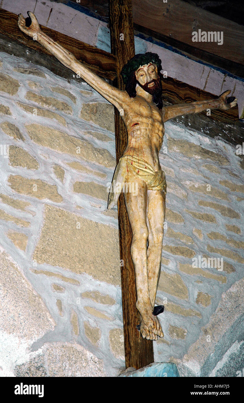In the Trémalo chapel, Pont-Aven, Brittany, hangs this wooden Christ, inspiration for Paul Gauguin's painting, 'Le Christ jaune' Stock Photo