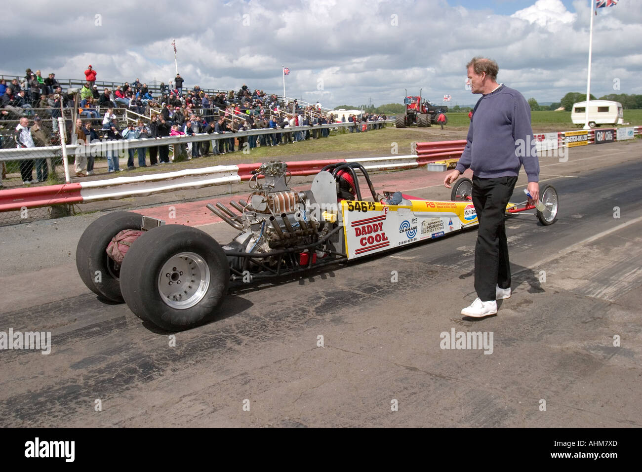 Dragster doing a test run to warm tyres prior to drag race Stock Photo ...