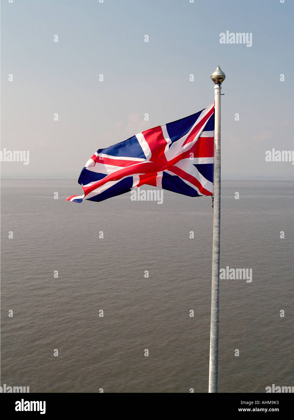The Union Jack flag of Great Britain flying at Clevedon Pier. Stock Photo