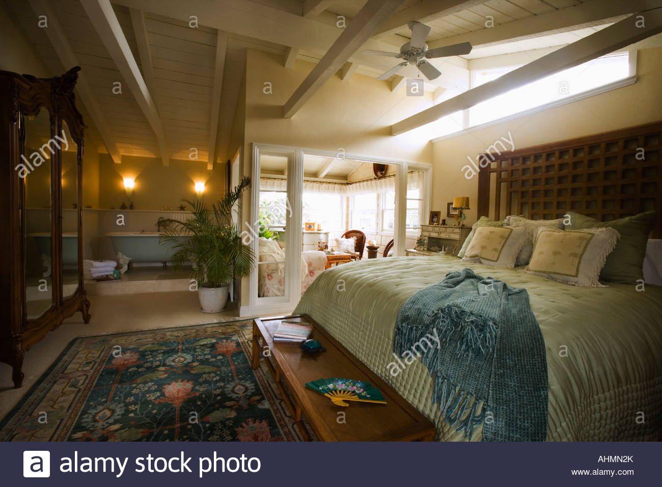 Large Master Bedroom With Claw Foot Tub Stock Photo