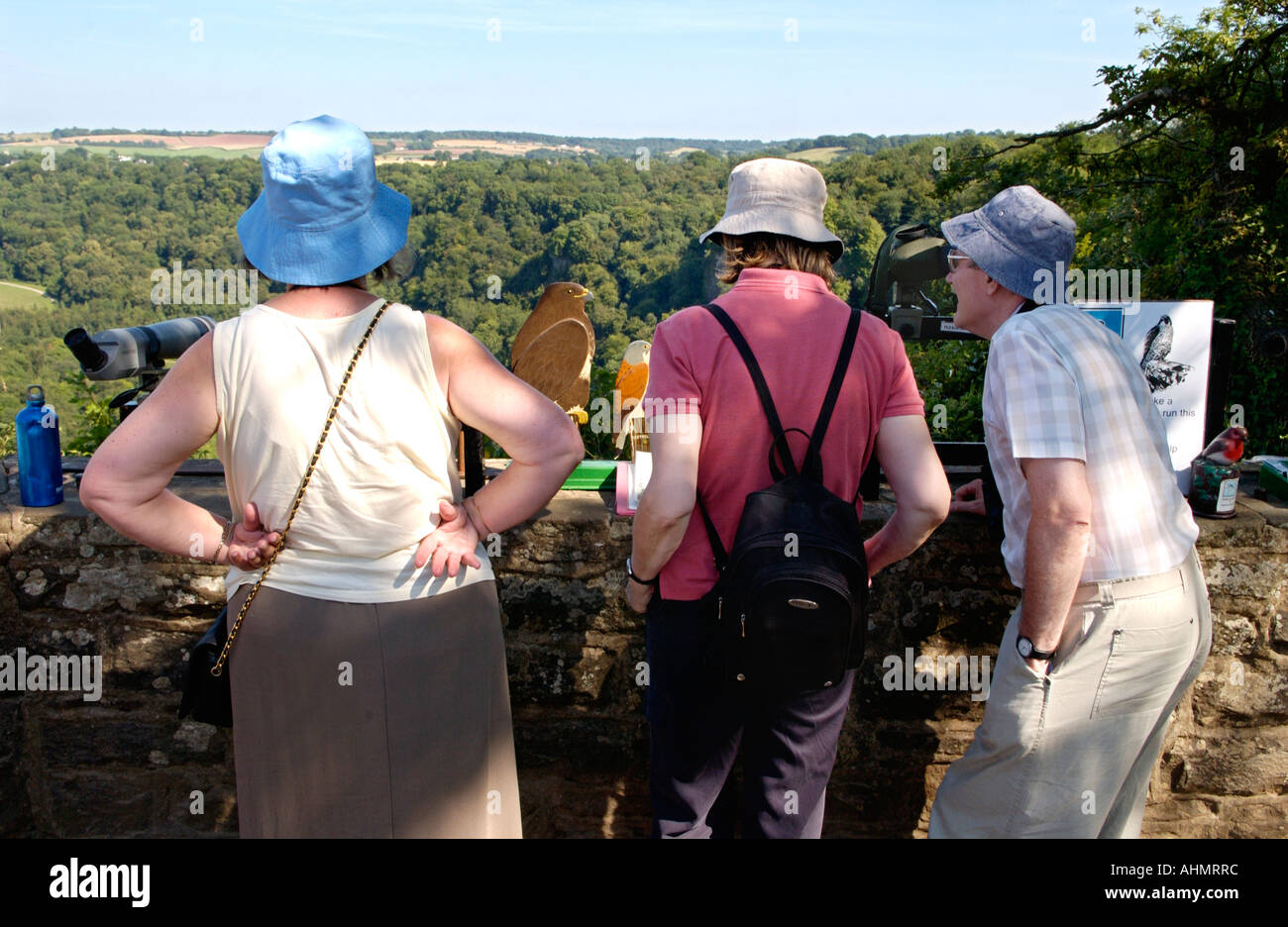 Tourists birdwatching at Symonds Yat Rock above the River Wye Valley Herefordshire England UK Stock Photo