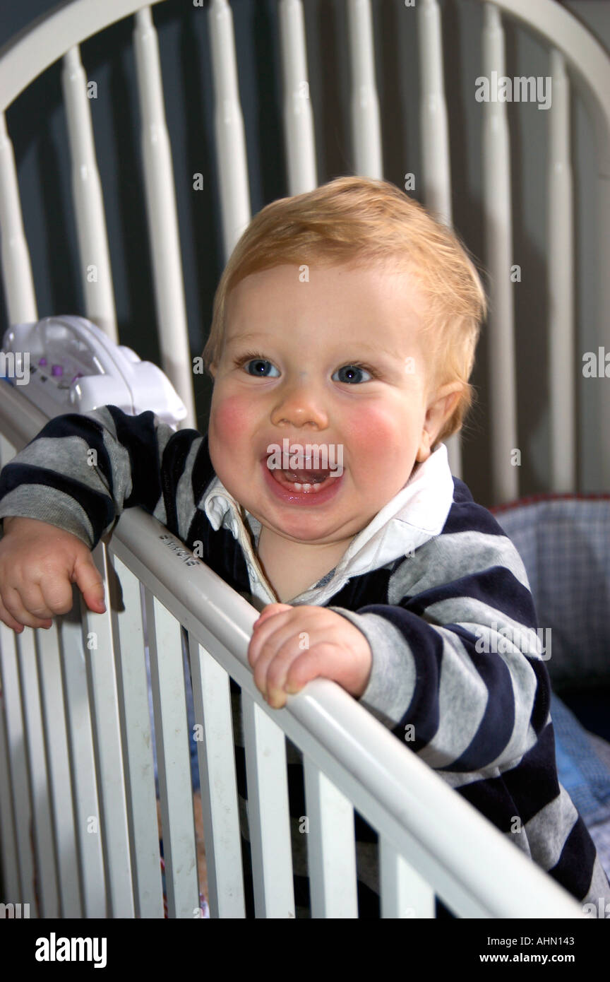 happy baby in crib Stock Photo Alamy