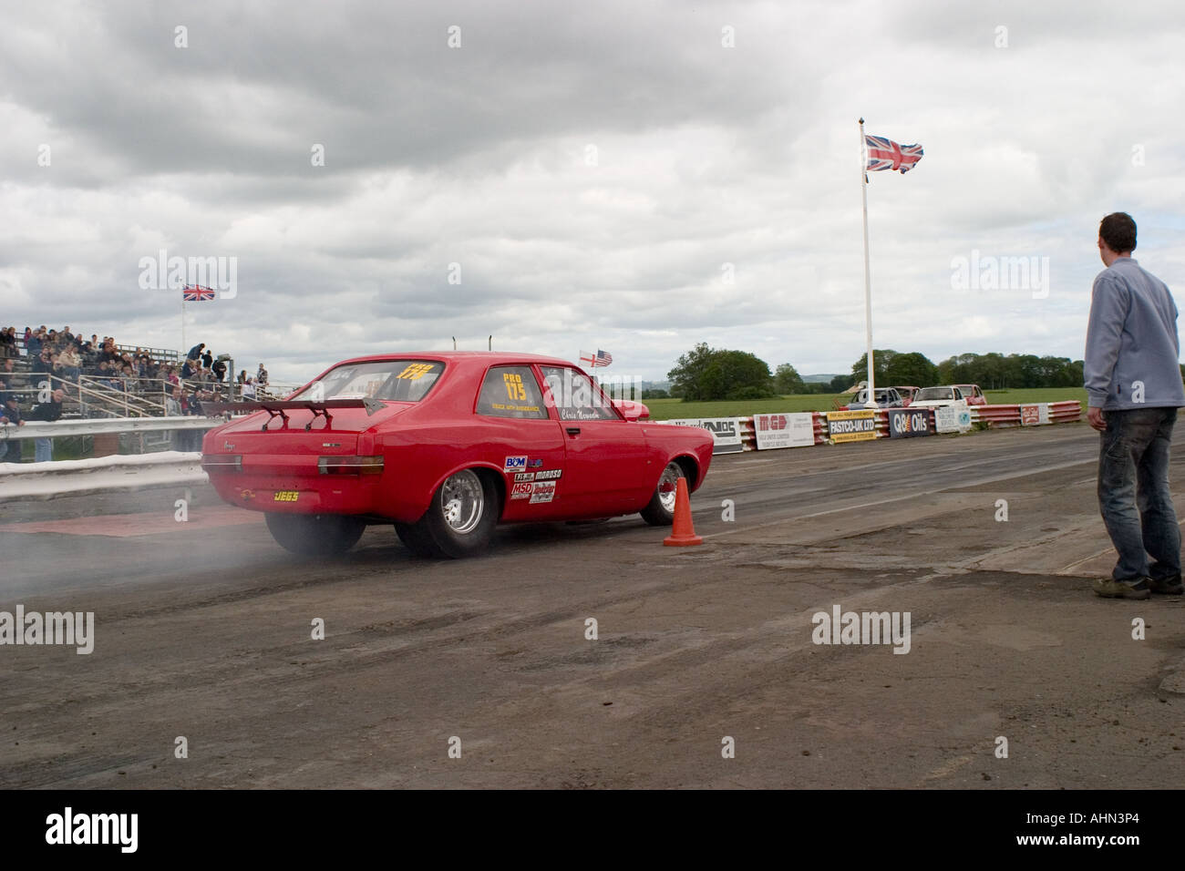 Routes Hillman Avenger dragster in burnout area Stock Photo