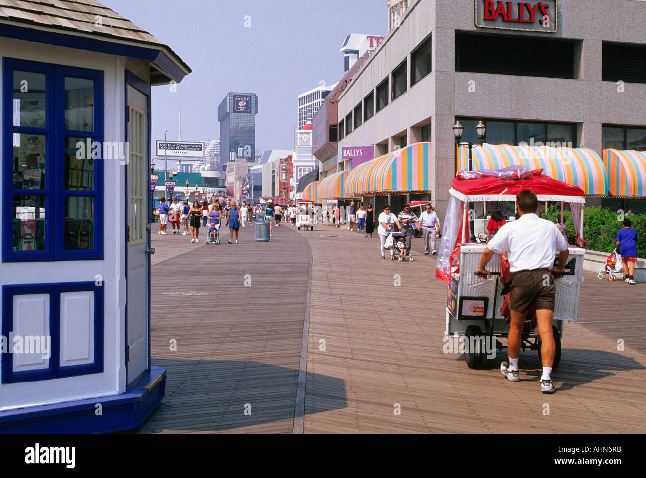 usa new jersey atlantic city nj the boardwalk man pushing rolling