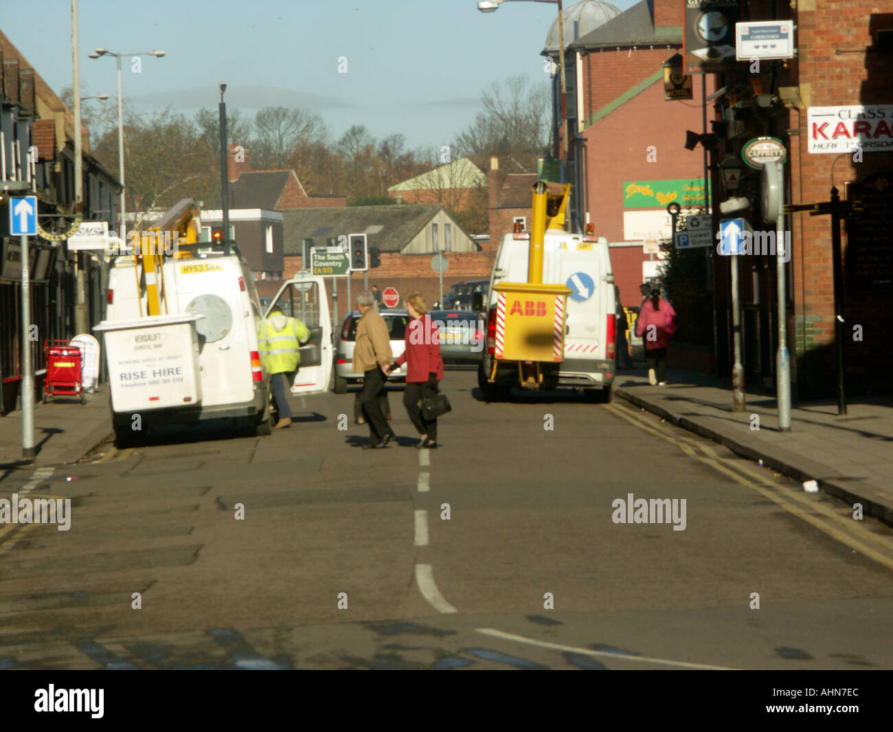 Two highrise access vehicles Stock Photo Alamy
