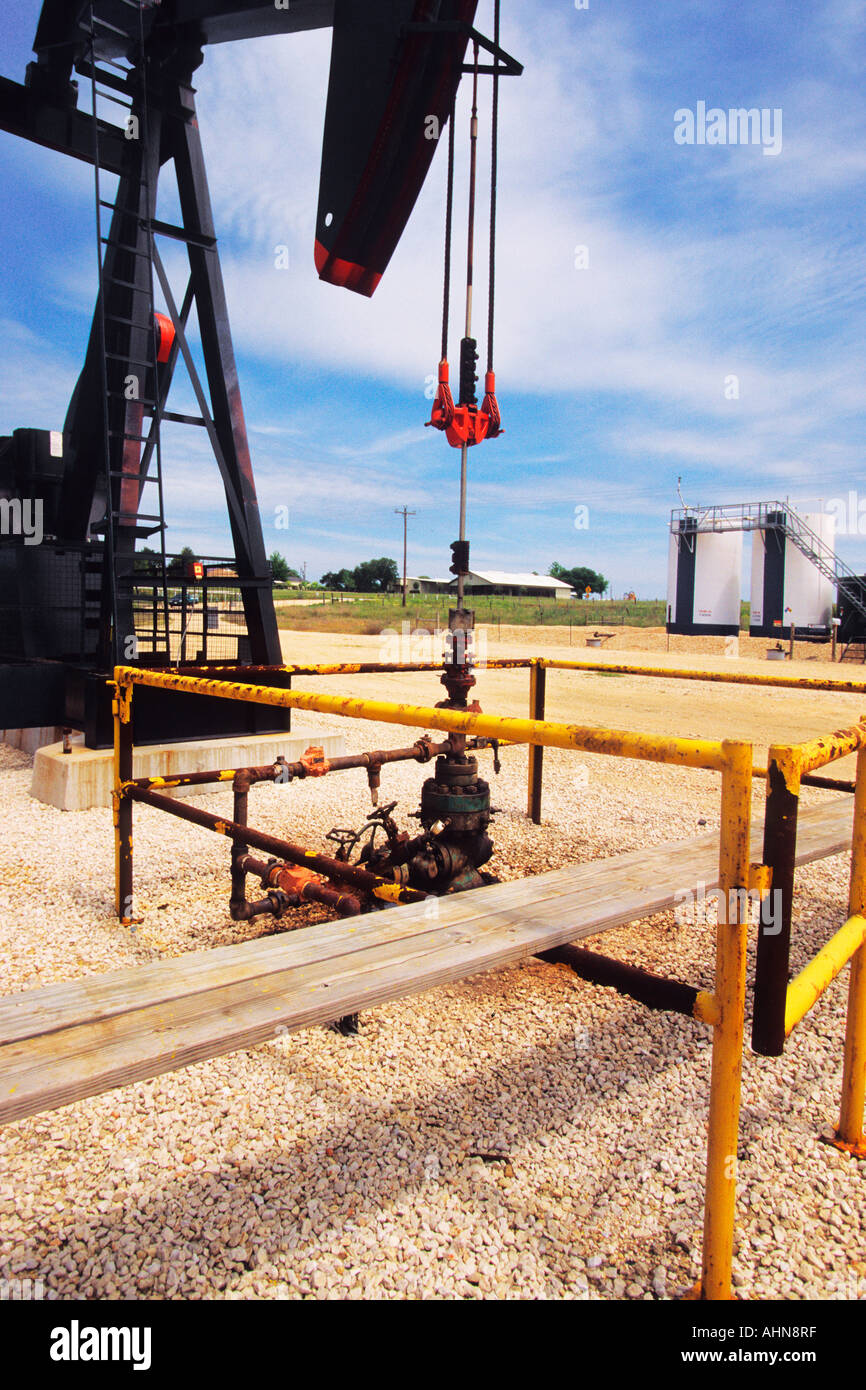 Crude oil pump jack in Texas oil field. Pumpjack. Hydraulic fracking