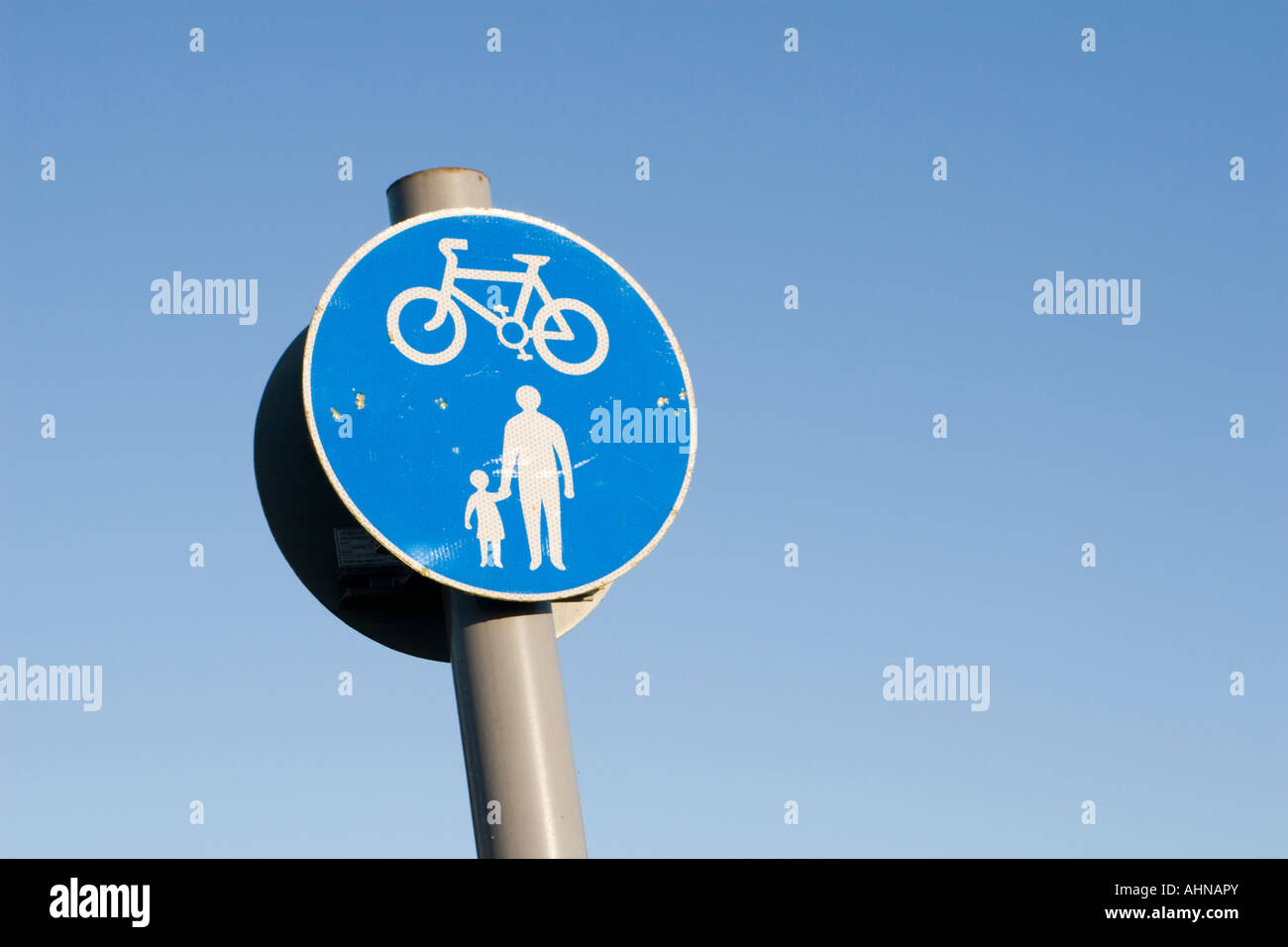 Cycle lane and foot path sign Stock Photo - Alamy