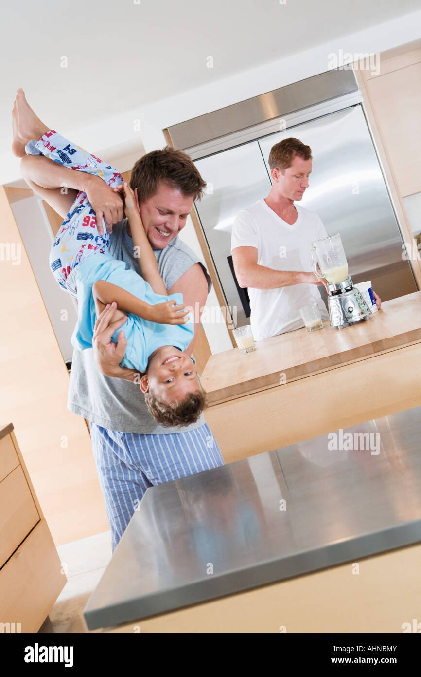 Gay father playing with his son Stock Photo