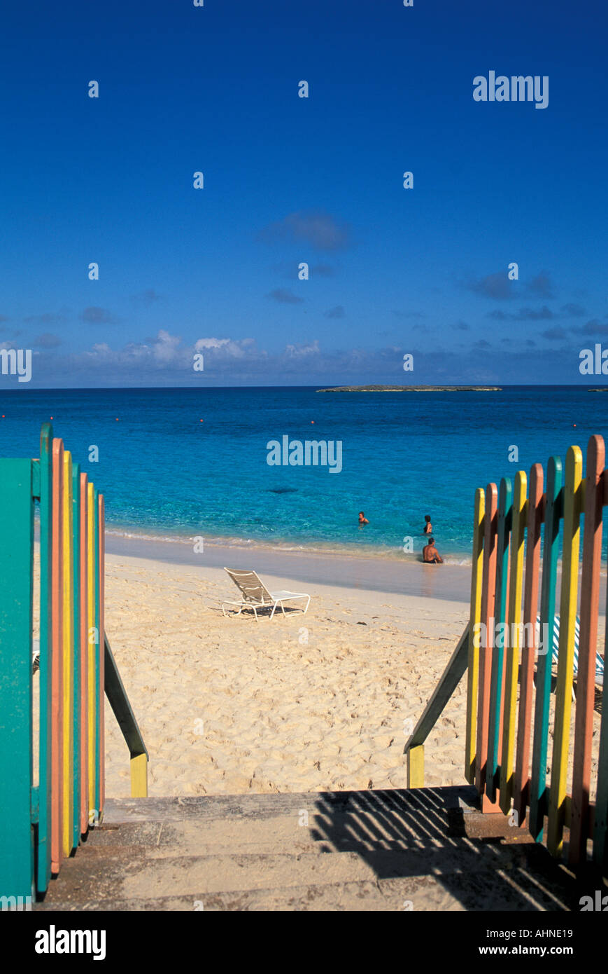 Bahamas Paradise Island Beach with colorful railings leading to the water at Atlantis Resort Stock Photo