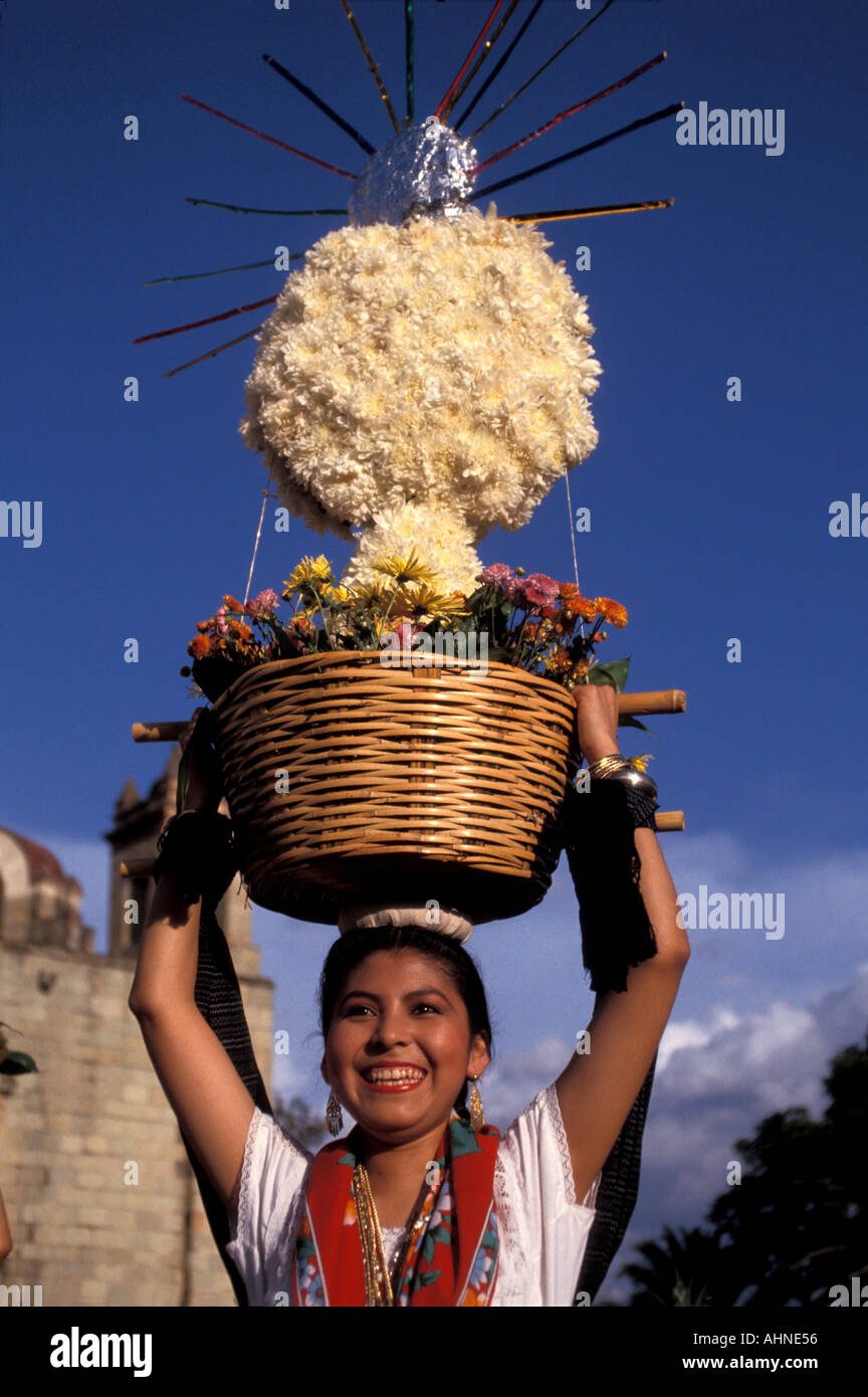 Mexico Oaxaca La Guelaguetza Festival held in July Woman Holding Basket Stock Photo