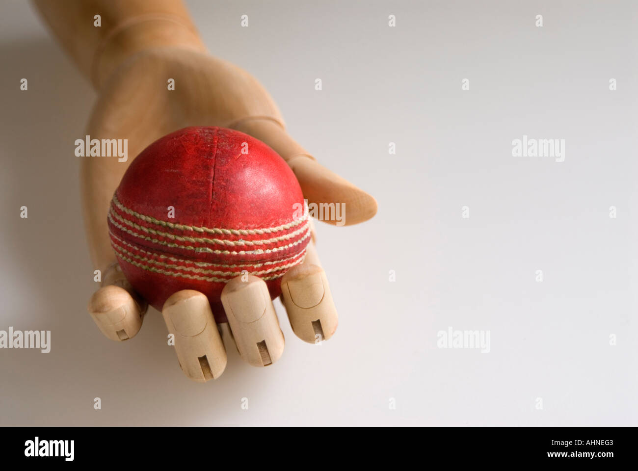 cricket ball caught in wooden hand Stock Photo Alamy
