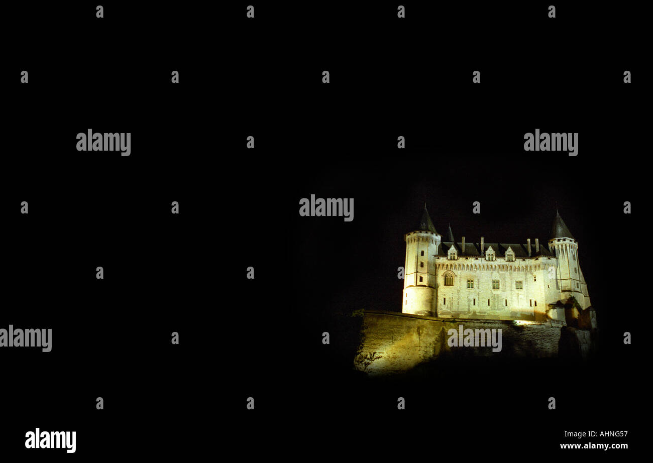 The Chateau de Saumur seen from below at night, once inhabited by Anne d'Anjou, Maine et Loire, France Stock Photo