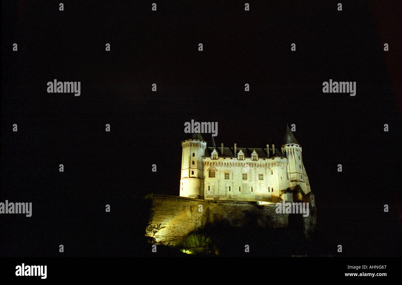 The Chateau de Saumur seen from below at night, once inhabited by Anne d'Anjou, Maine et Loire, France Stock Photo