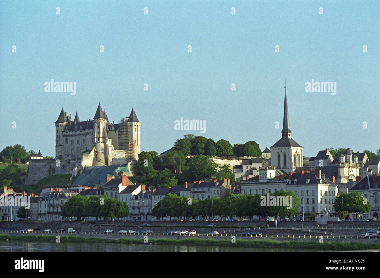 The Chateau de Saumur on the south bank of the Loire in the town Saumur, once inhabited by Anne d'Anjou, as seen from the bridge crossing the river., Maine et Loire, France Stock Photo