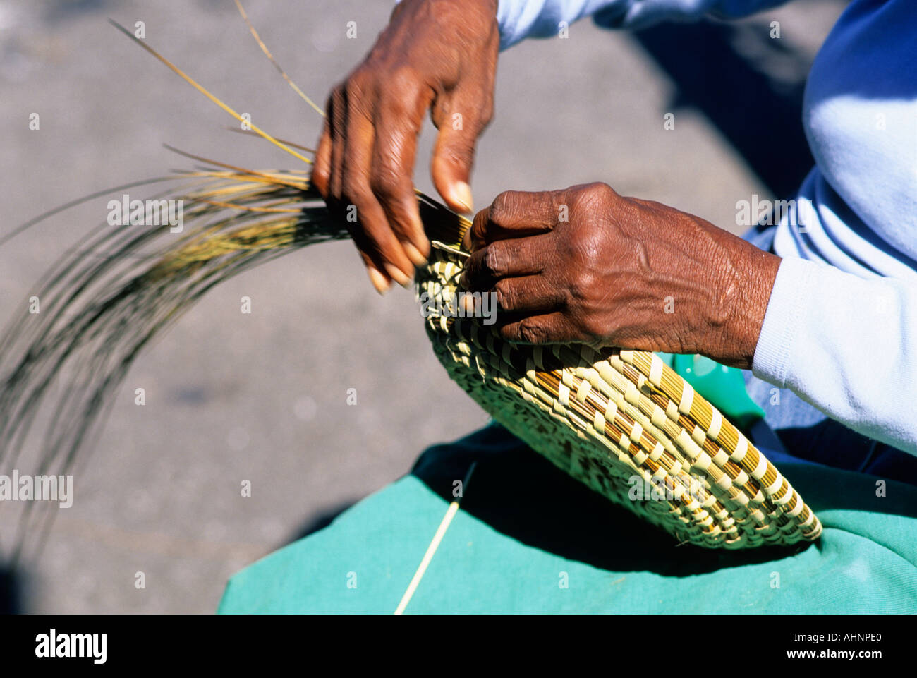 African american woman making sweet grass baskets in Charleston South Carolina  Stock Photo