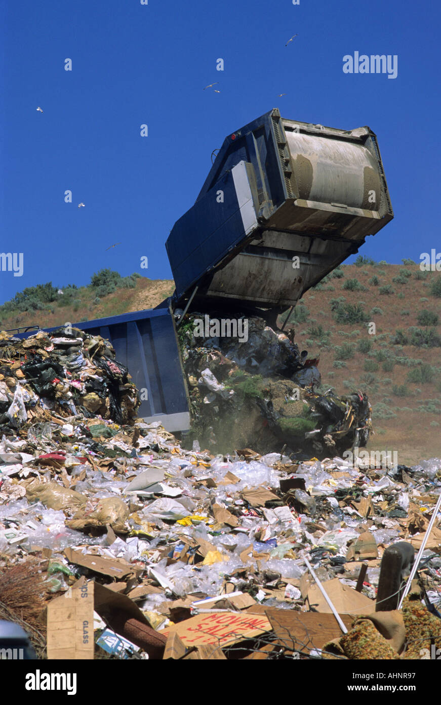 A large dumpster unloads trash at a sanitary landfill in Boise Idaho Stock Photo Alamy