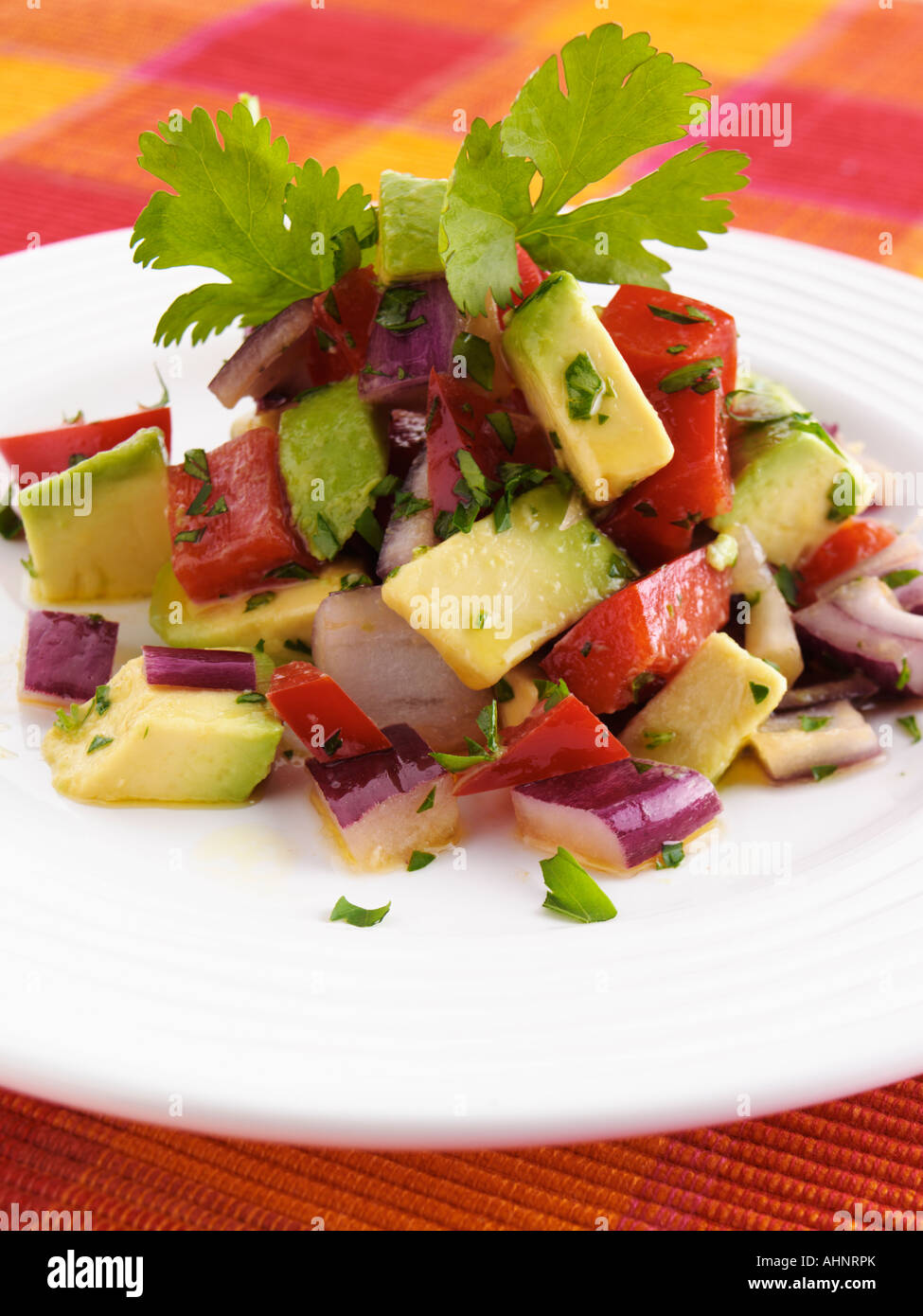Avocado and red onion salad editorial food Stock Photo - Alamy