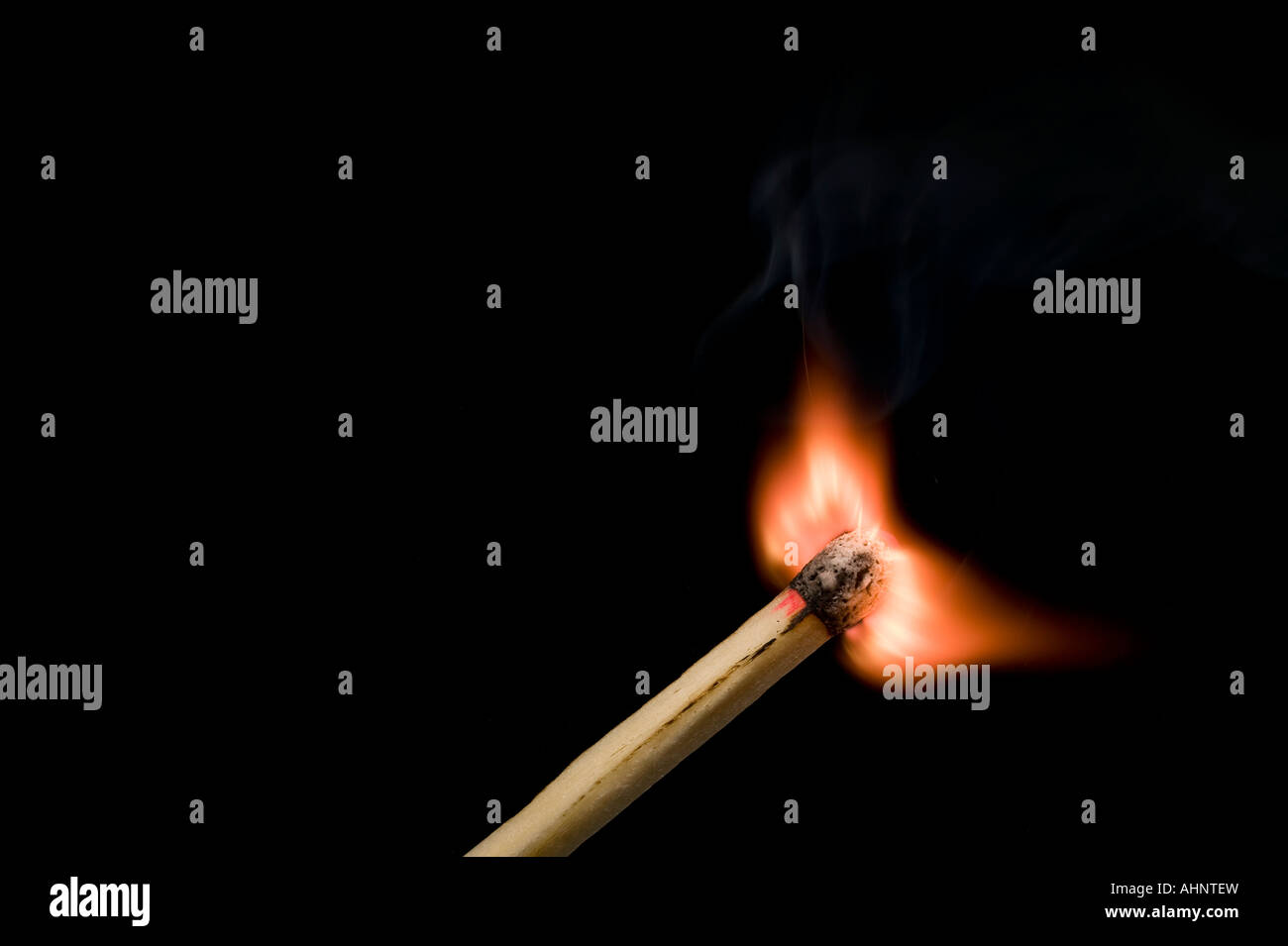Lit Match On Black Background Stock Photo - Alamy