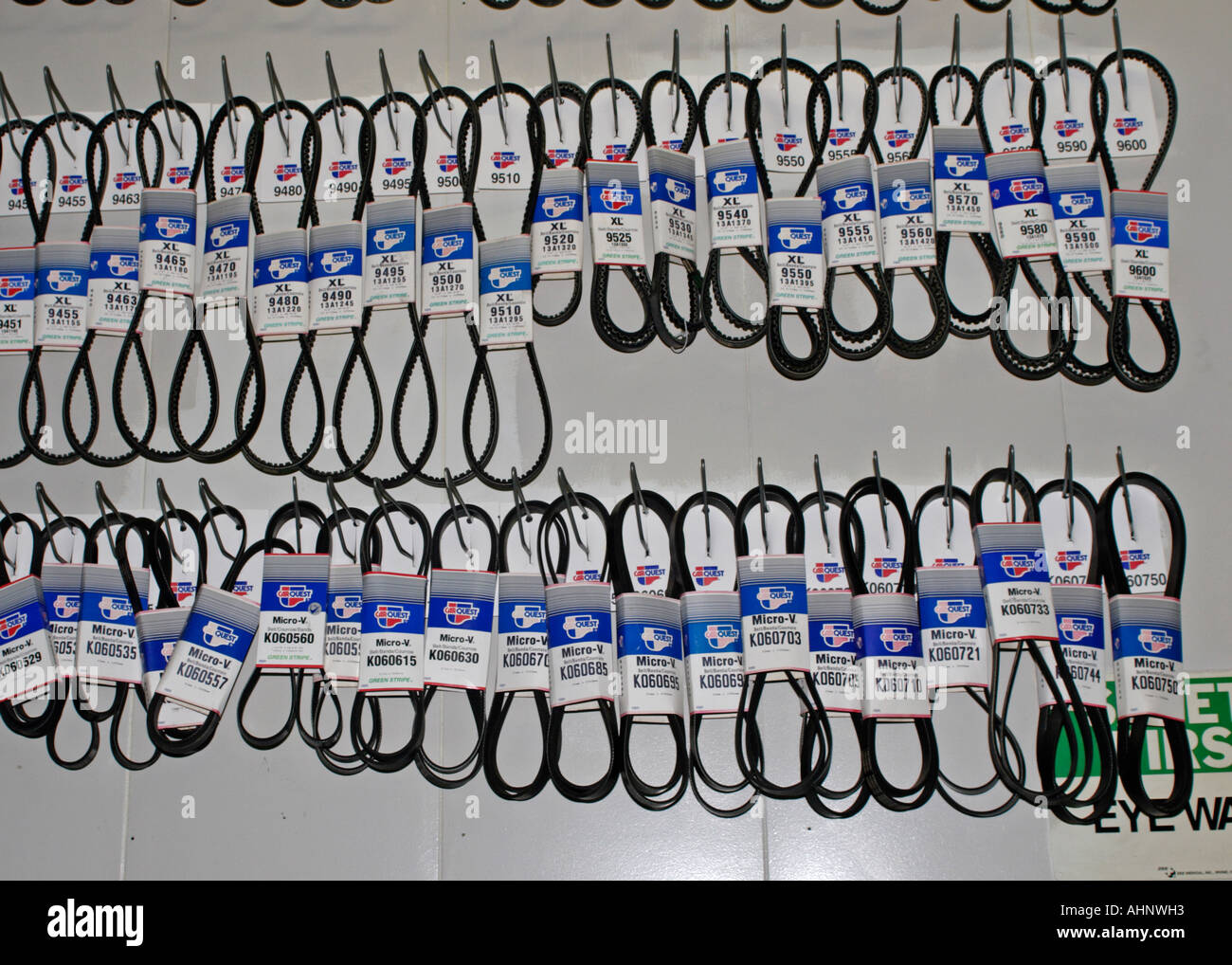 Fan belts hanging on garage wall Stock Photo Alamy