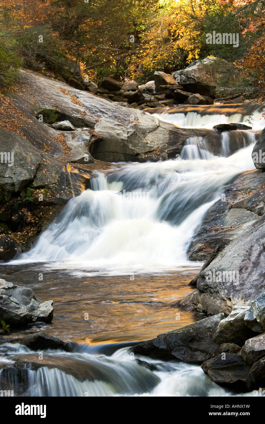Mountain stream and waterfall Stock Photo - Alamy