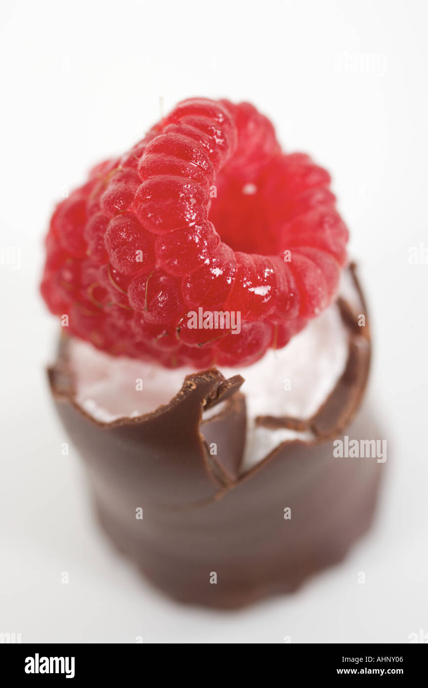 Chocolate kiss with a raspberry on top Stock Photo