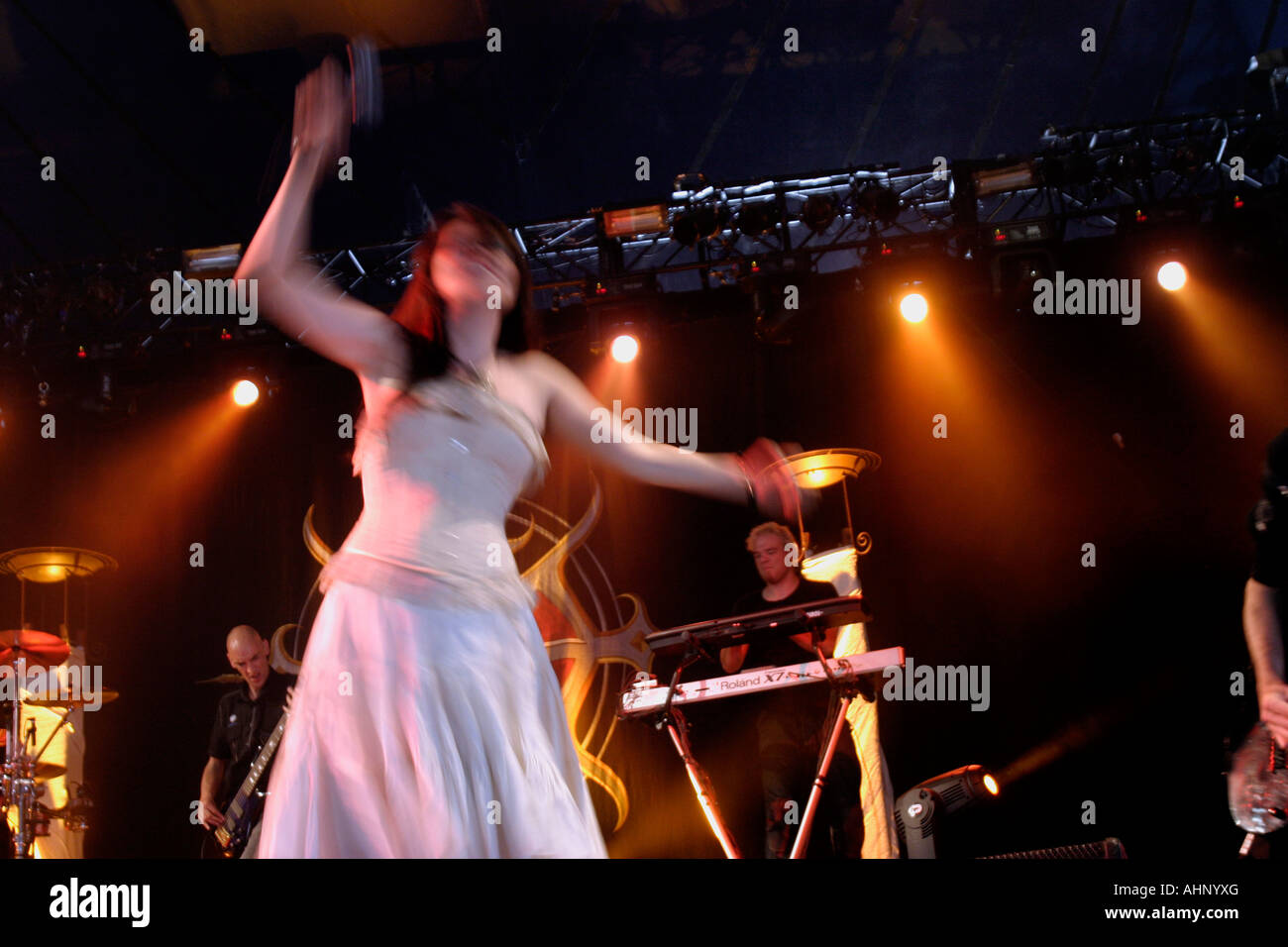 Amy Lee, vocalist, Evanescence, American alternative rock band, from Little Rock, Arkansas, Amy Lee, vocals, Terry Balsamo, guitar, long hair, Will Hunt, drums, Tim McCord, bass guitar, Troy McLawhorn, Guitar, Download Rock Festival, Donnington Park, Leicestershire, UK, blur Stock Photo