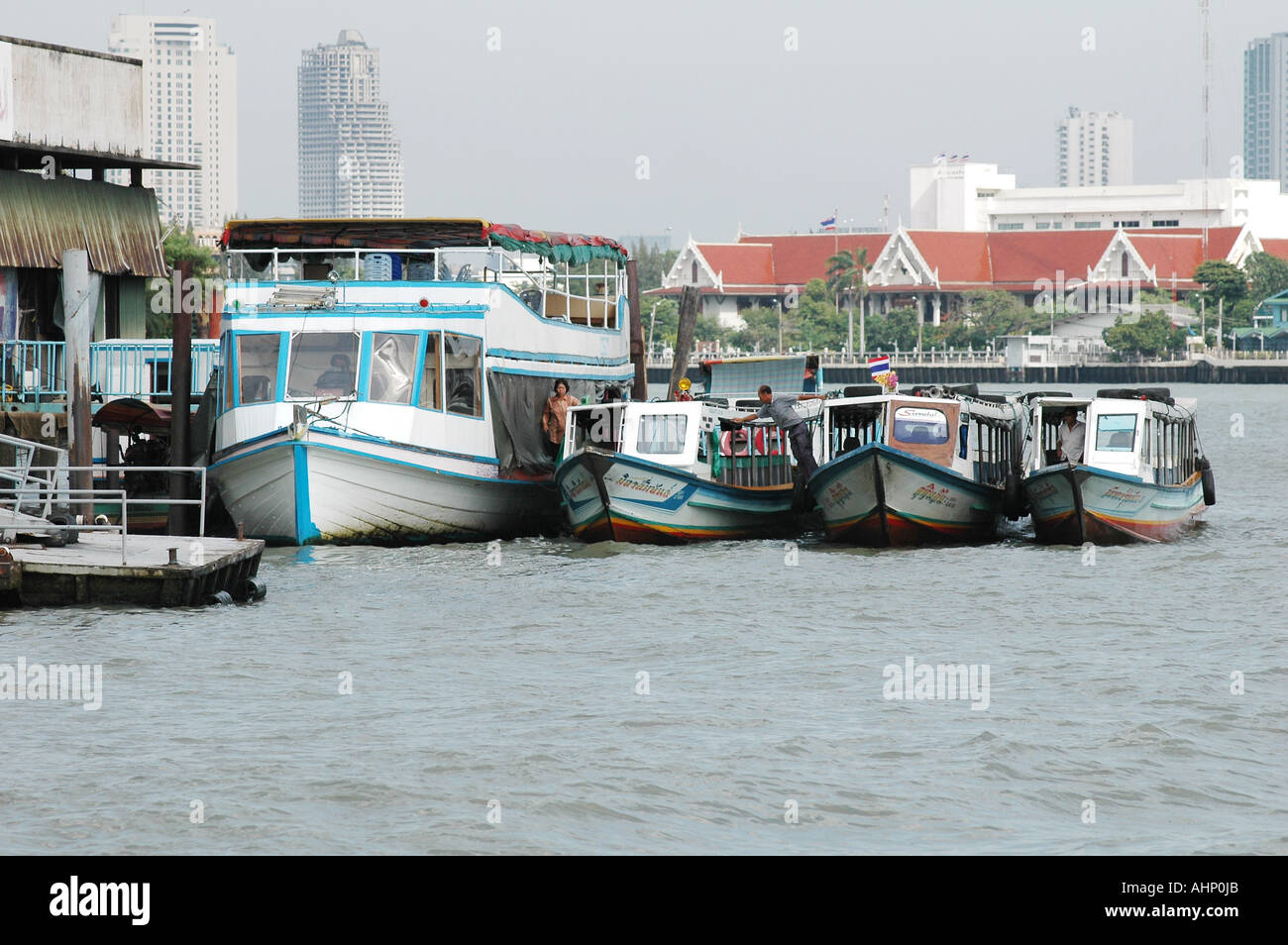 Boats on the Chao Phraya river in Bangkok Thailand Stock Photo - Alamy