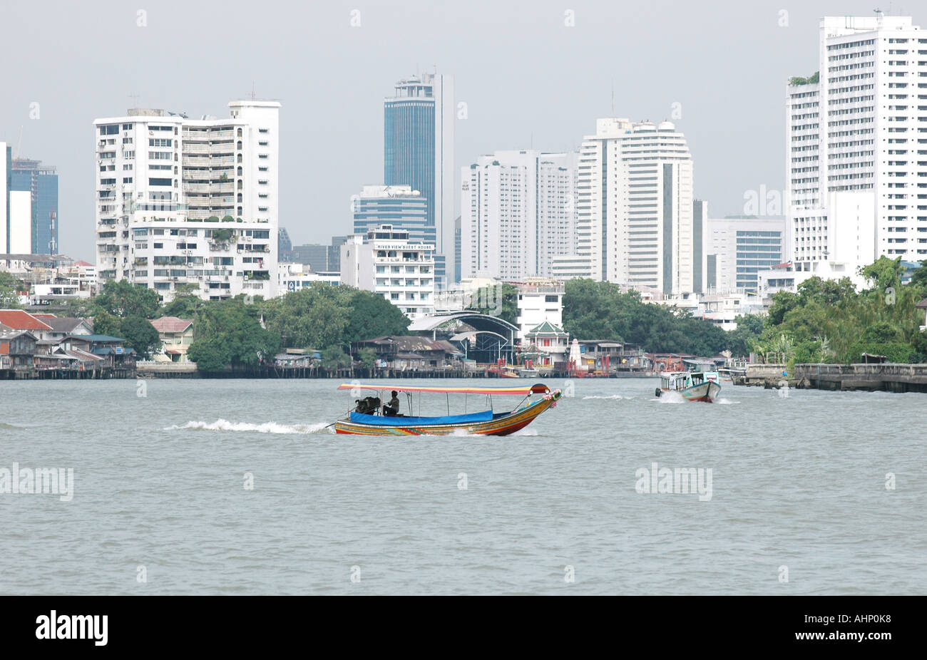 Boats and the Chao Phraya river in Bangkok Thailand Stock Photo - Alamy