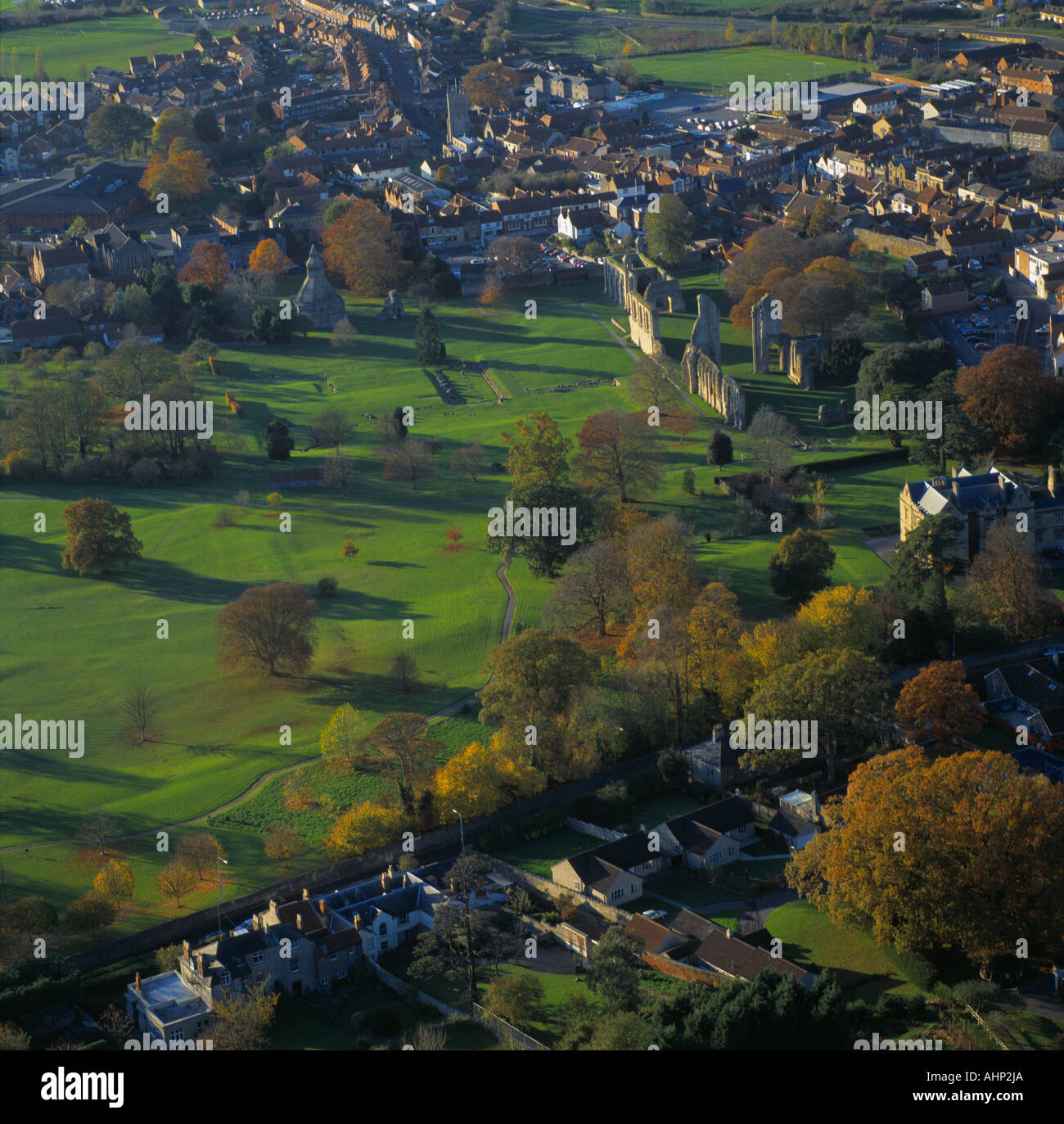 Glastonbury town & Abbey ruins Somerset UK aerial view Stock Photo