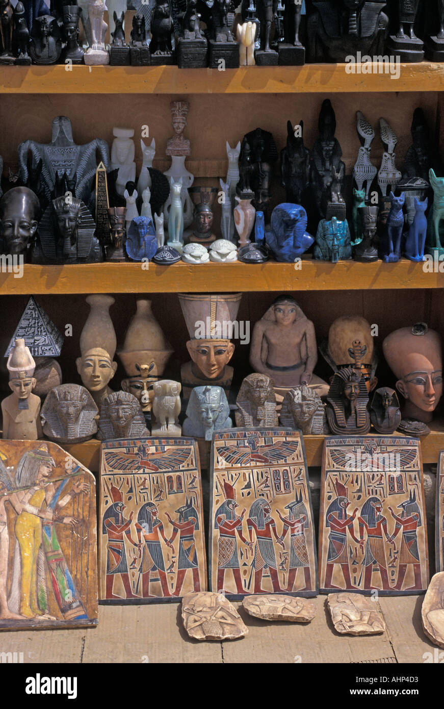 Selection of tourist souvenirs depicting egyptian antiquities for sale