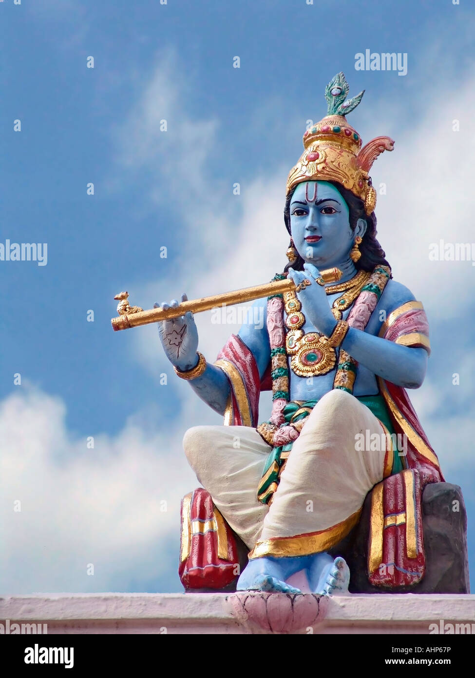 Hindu God Lord Krishna sculpture on Sri Mariamman temple Singapore Stock Photo