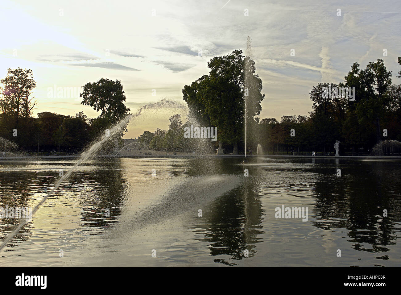 Fountains in the Tuileries gardens early in the morning in Paris France Stock Photo