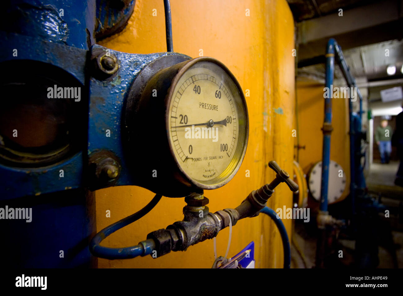 An old pressure gauge pipes and tanks Stock Photo - Alamy