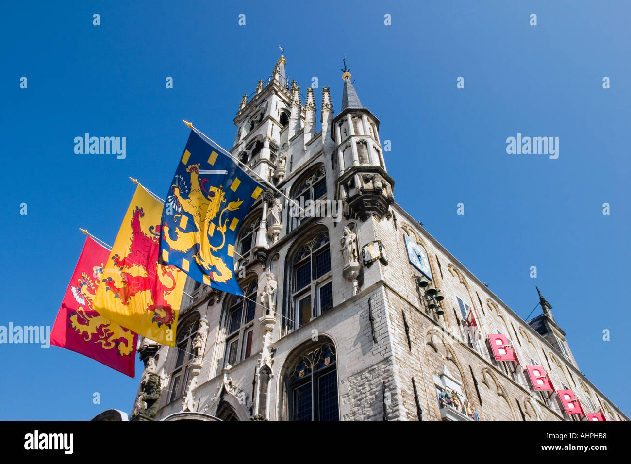 Colourful flags on Town Hall, Gouda, Southern Holland, The Netherlands Stock Photo